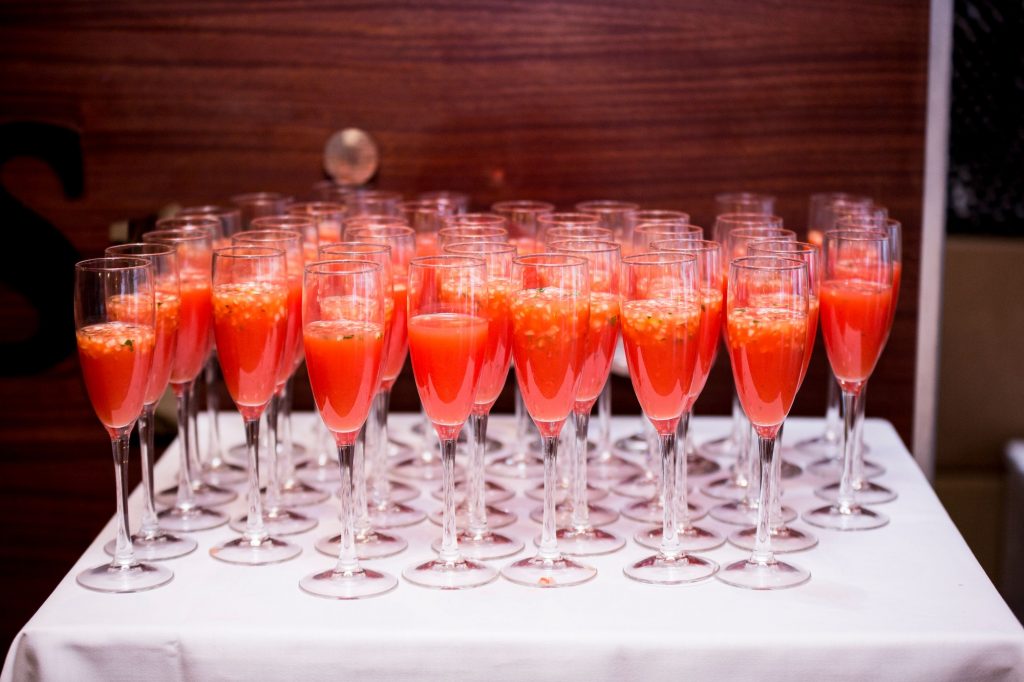 Table with orange cocktails for a event