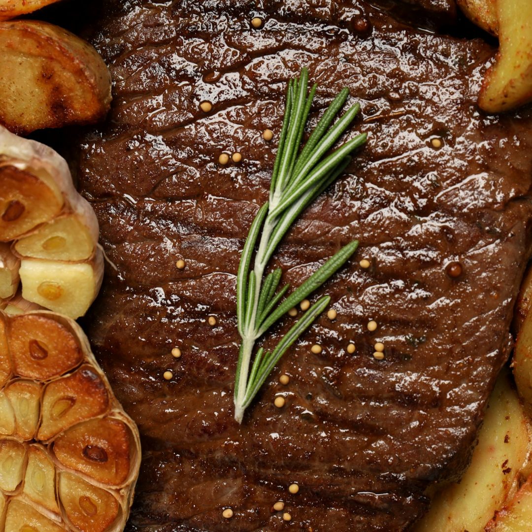 Concept of tasty food with beef steak, close up