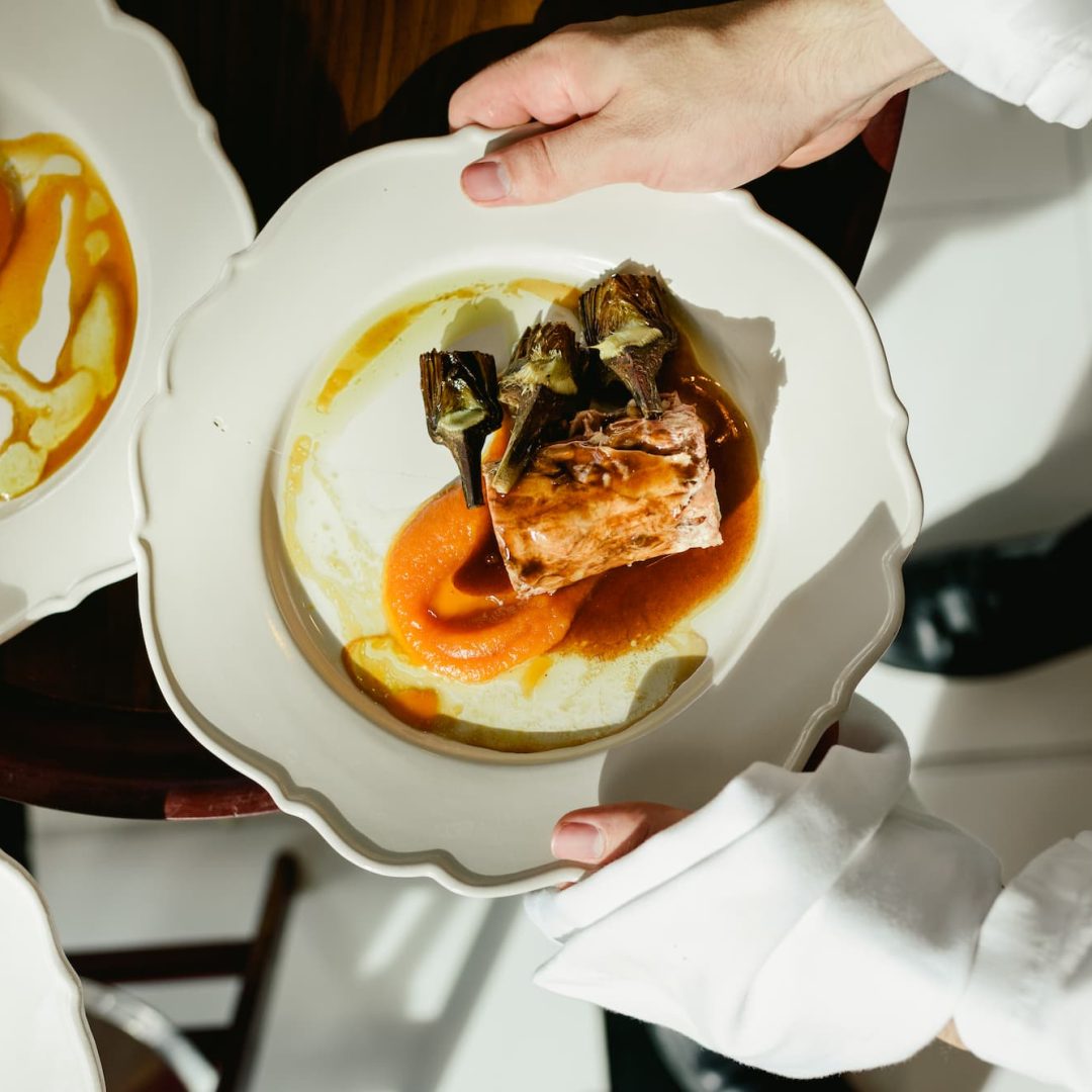 many-dishes-loin-of-pork-confit-with-artichokes-an-2023-11-27-05-27-49-utc (1)