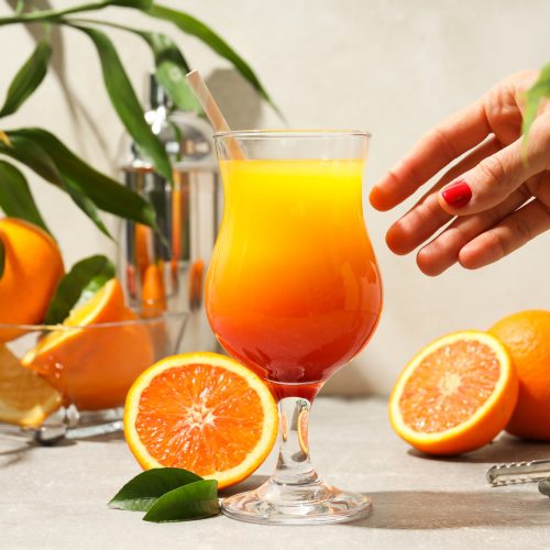 Orange cocktail, concept of fresh delicious summer citrus cocktail